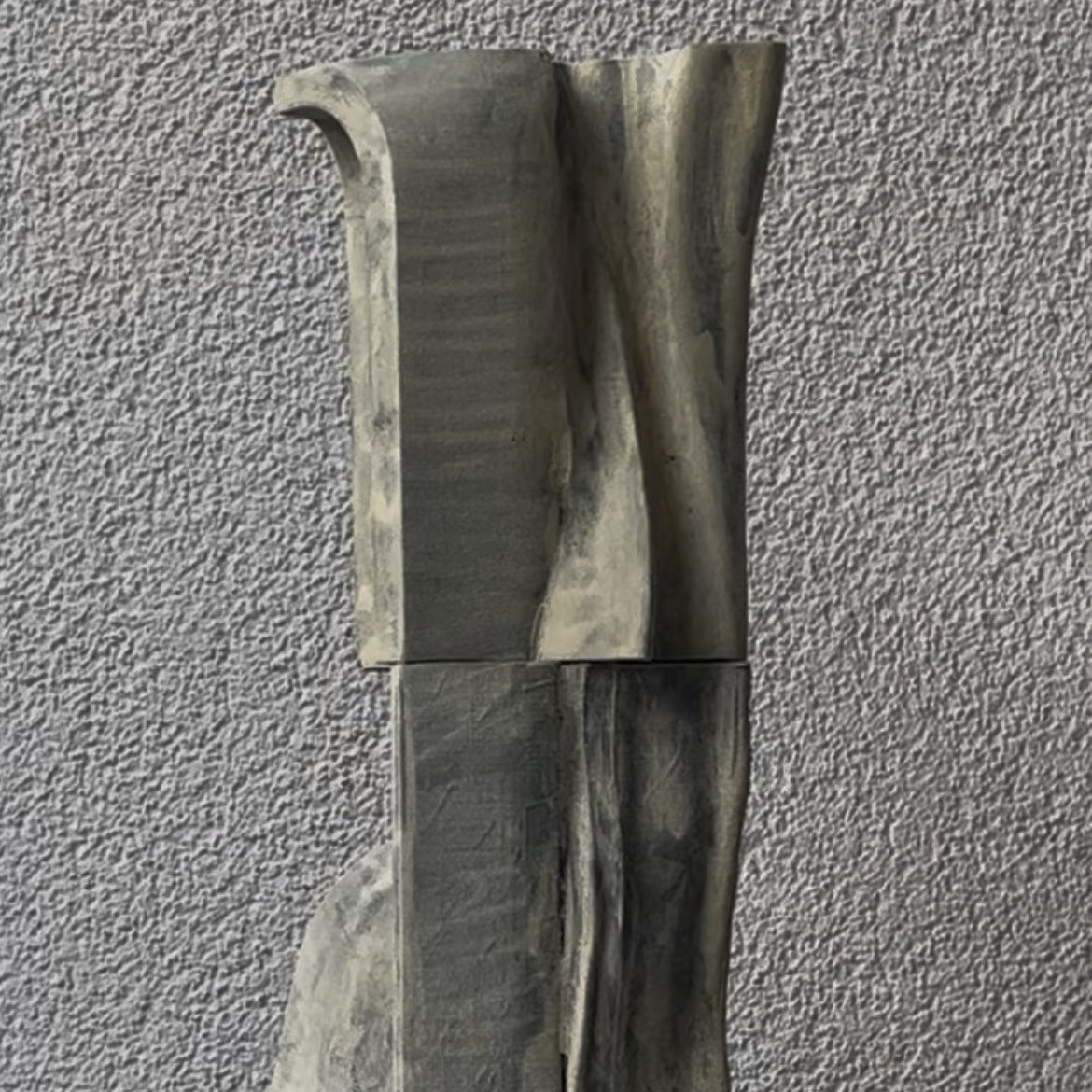 Study IV — a paneled, grooved sculptural totem in grey and bone tones